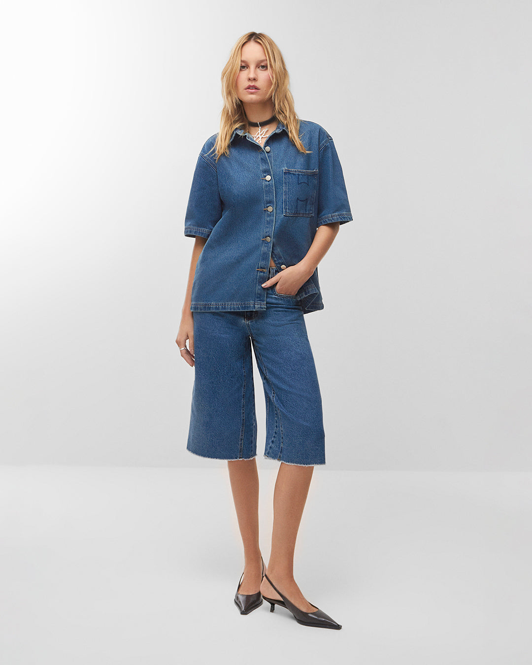 Bermuda jeans reta lavagem azul vintage