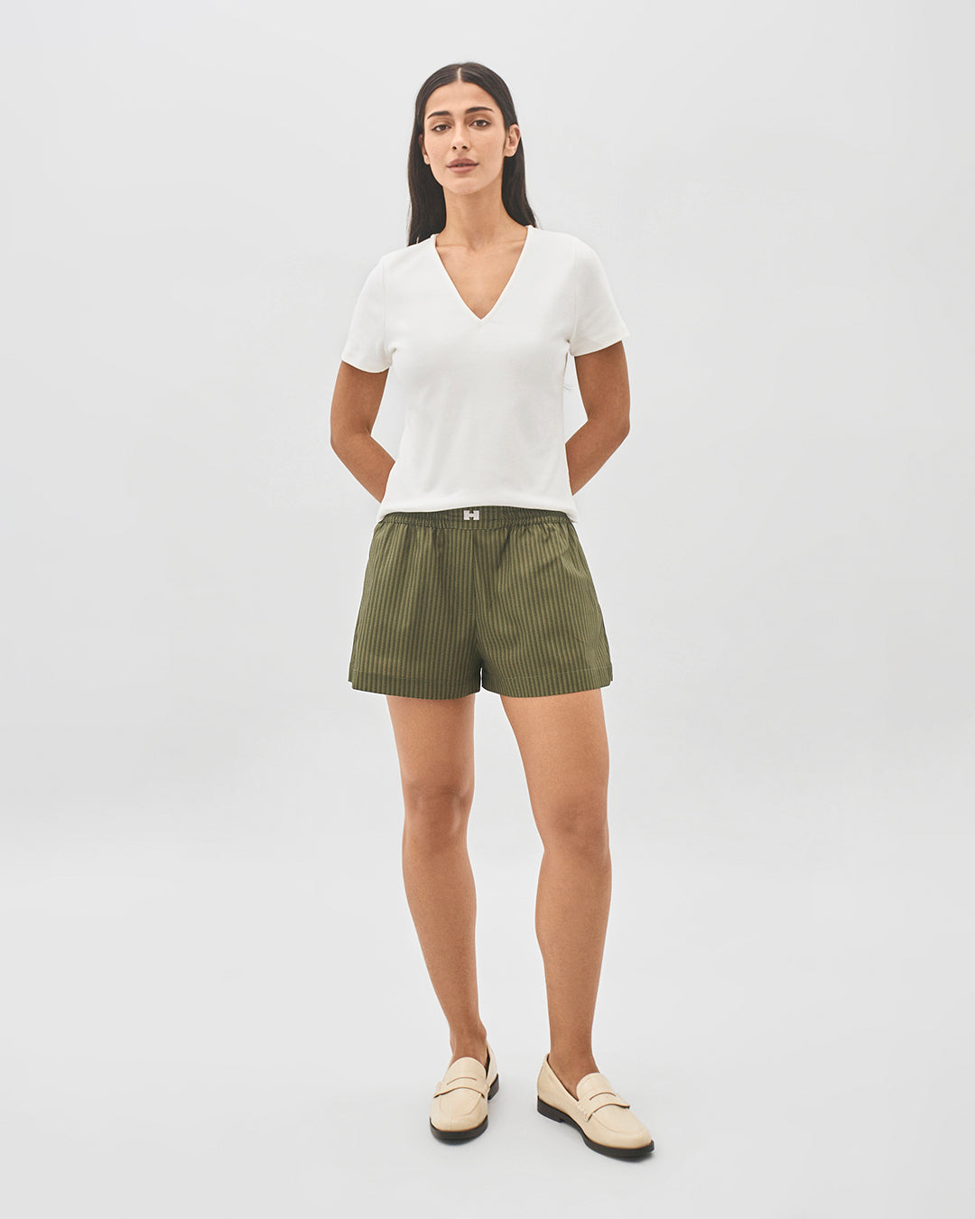 Short cós elástico estampa listrada verde